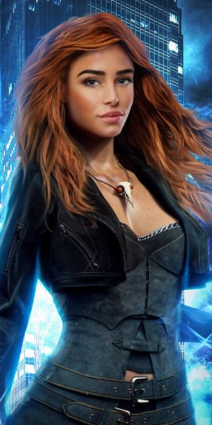 A closeup of a young woman with red hair, standing against an urban background in blue tones.