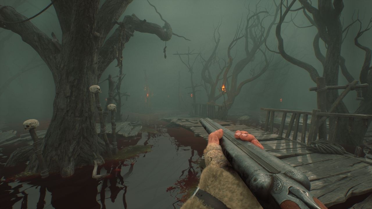 In a first-person view, the hero wanders along some wooden planking with a rail that leads over fetid swamp water with skulls hanging from a partially submerged tree trunk.