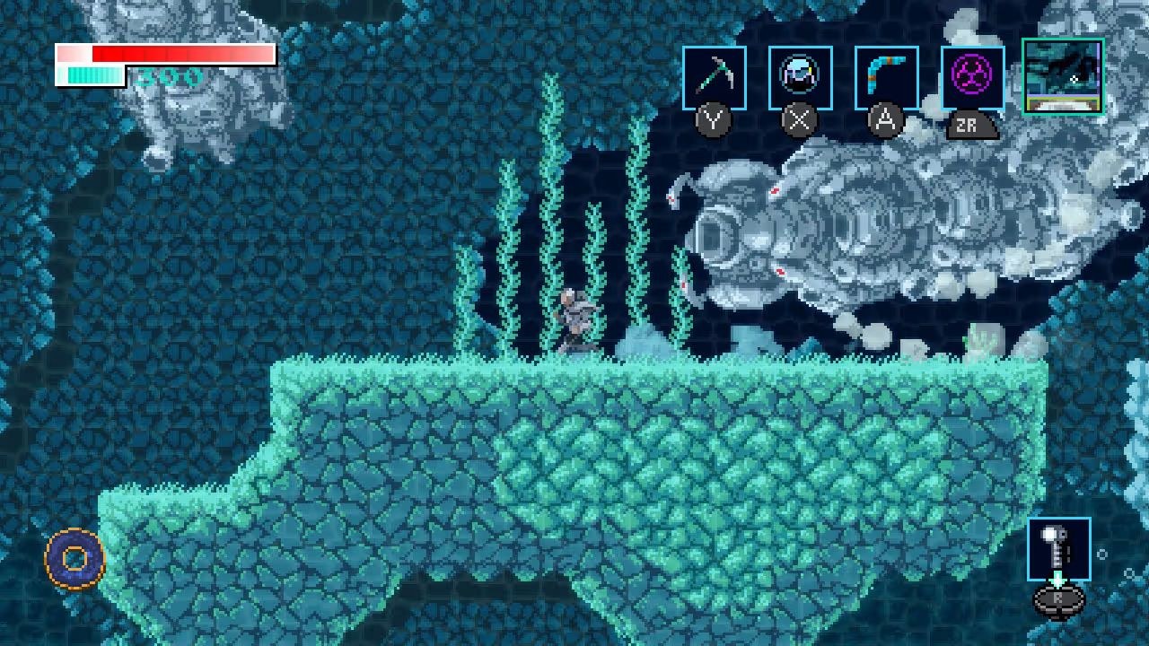 The hero runs left along a green platform, which has sea plants growing from it, as a machine that looks like a giant underwater worm pursues.
