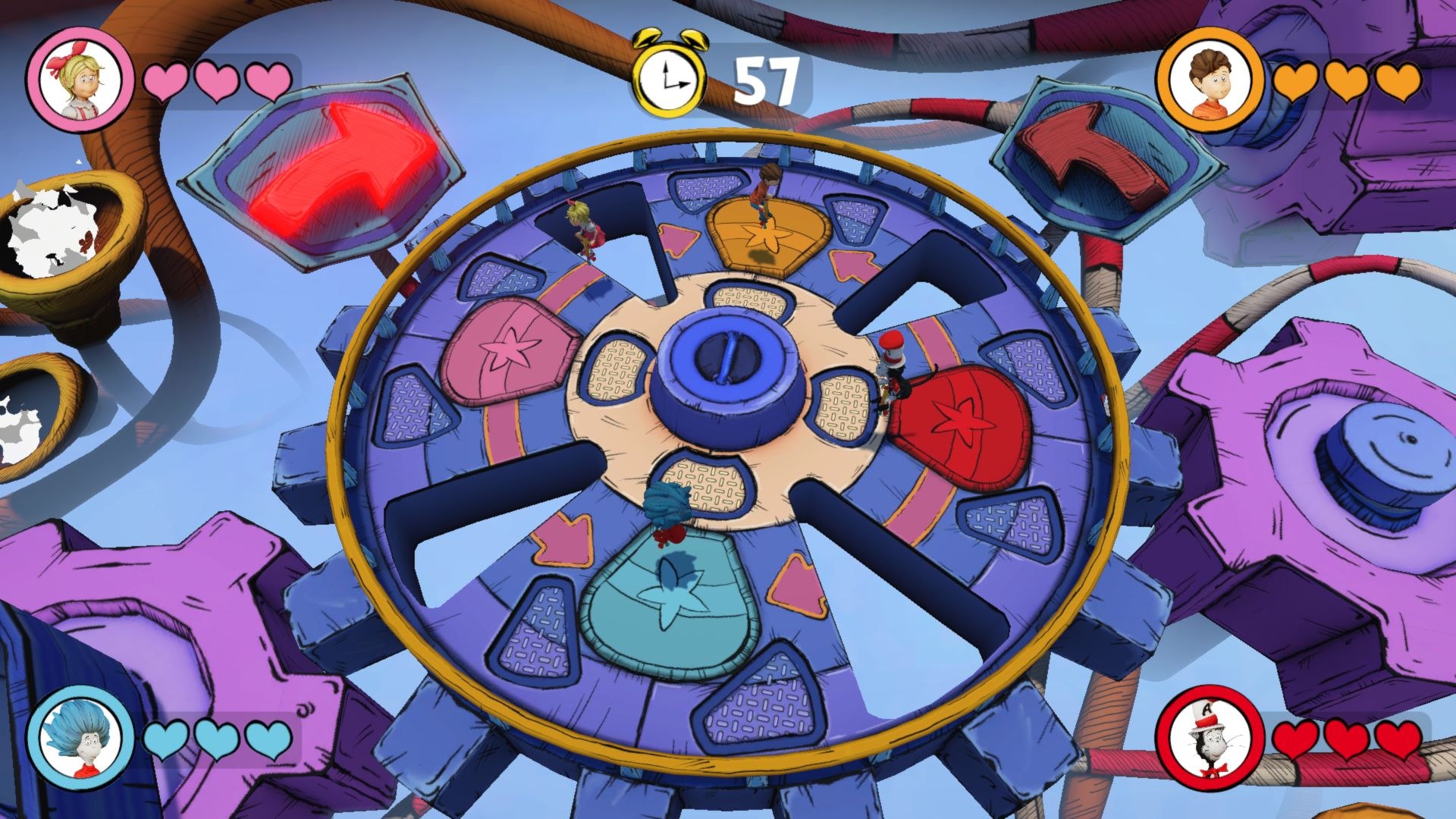 Players are on a giant rotating wheel with holes and obstacles, apparently trying to avoid being knocked into one of the large openings.