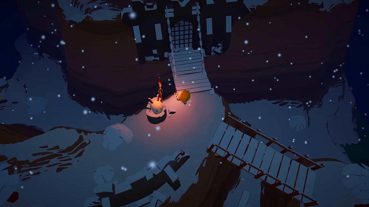 A bird is on a rocky, snow-covered ledge near the entrance to a castle with a lowered drawbridge and portcullis. Snowflakes fall.