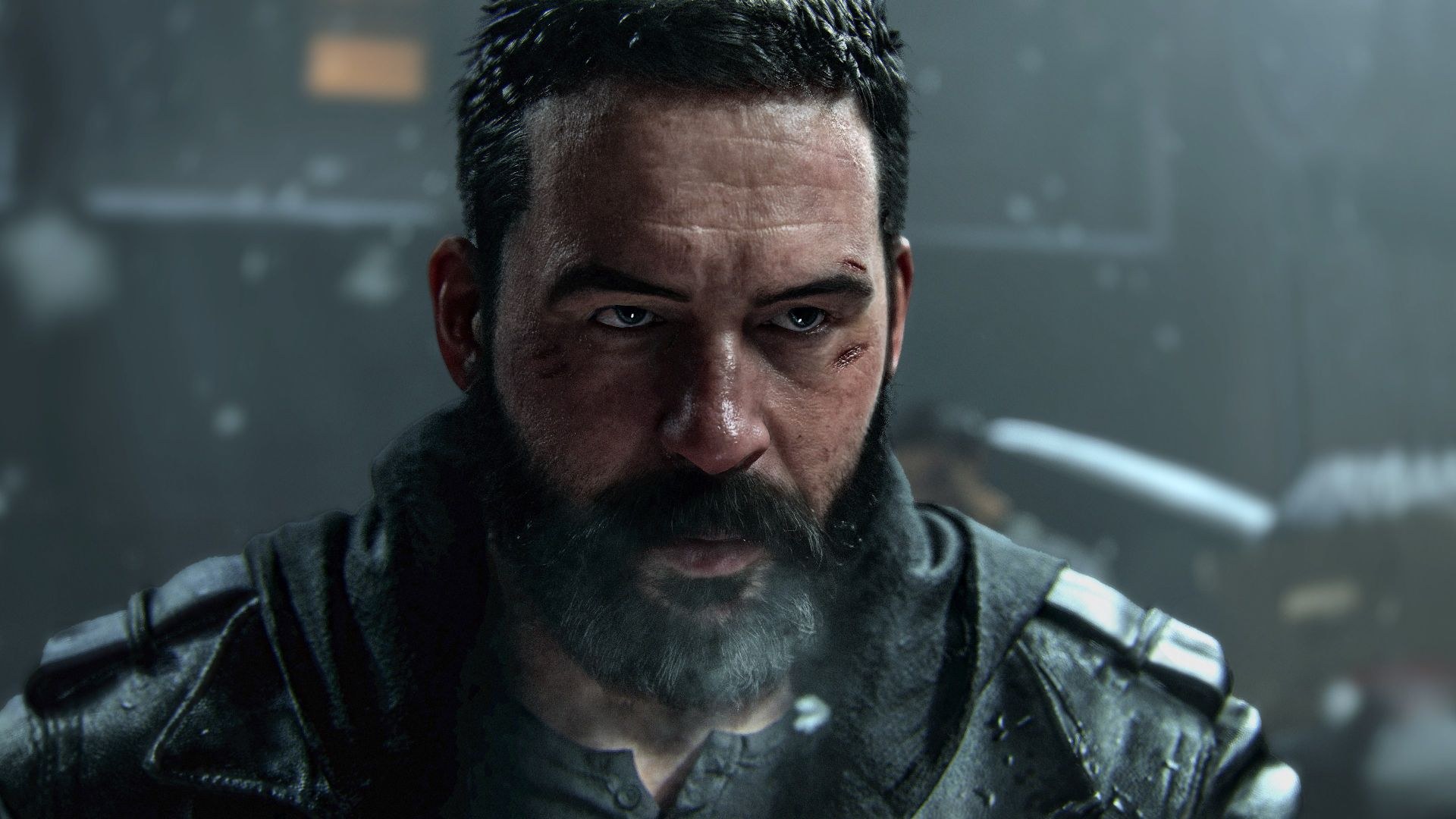 A closeup of a bearded soldier with flecks of gray, looking toward his left with apprehension.