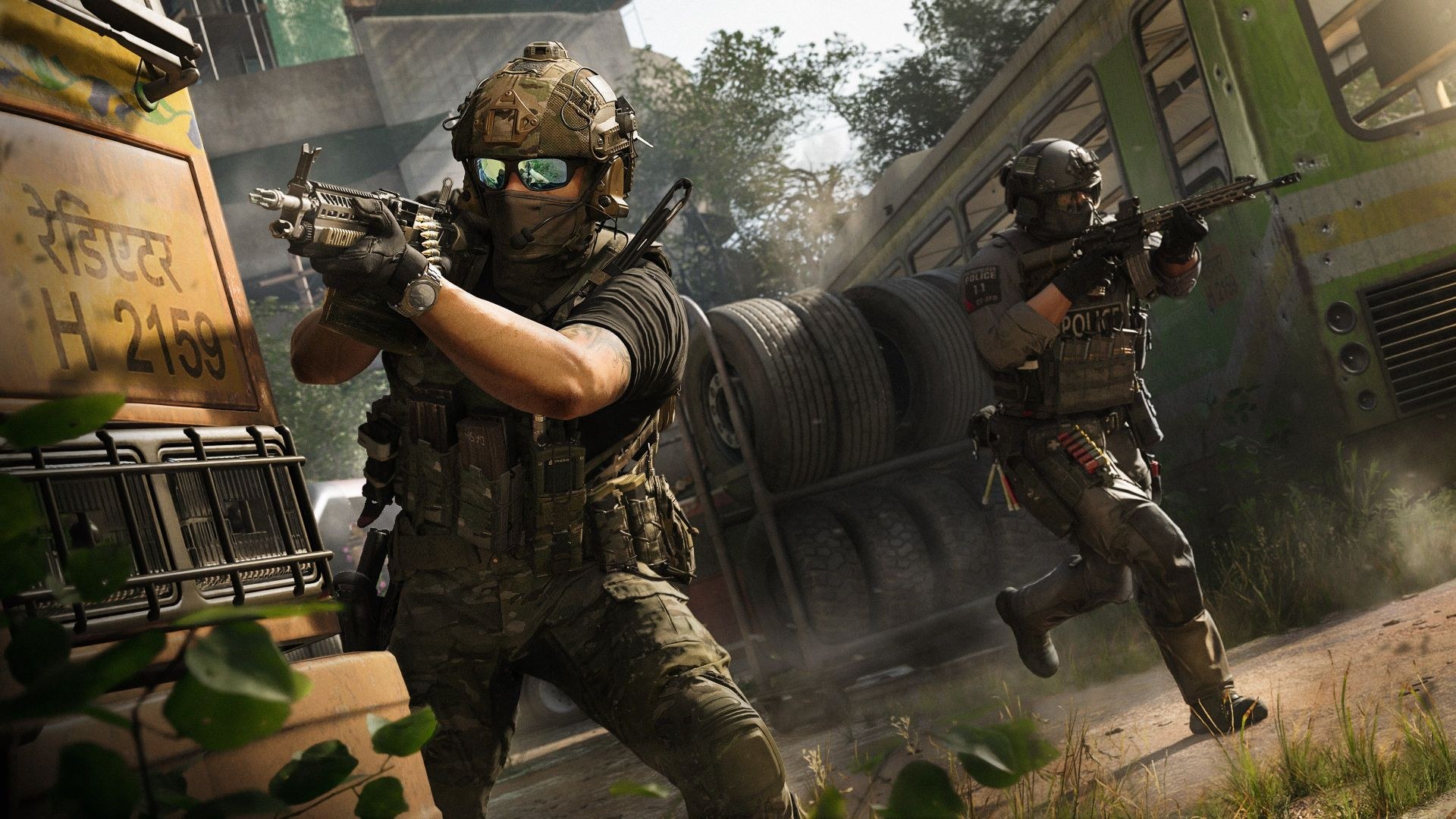 Two soldiers advance through an urban area. One of them rounds a corner as the other races into open ground, wearing tactical police gear.