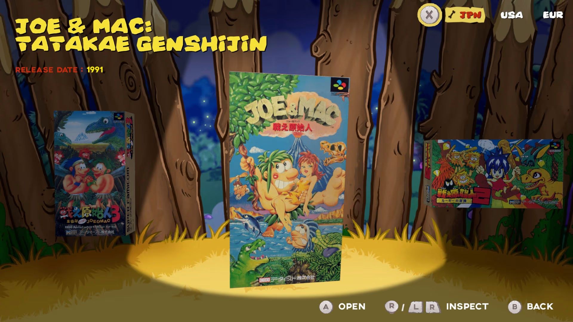 An in-game gallery shows cover art for Joe & Mac: Tatakae Genshijin, released in 1991, with a spotlight shining on it.