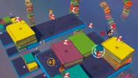 The players move about on stacks of oversized books, while interacting with diamond-shaped kits colored red and white.